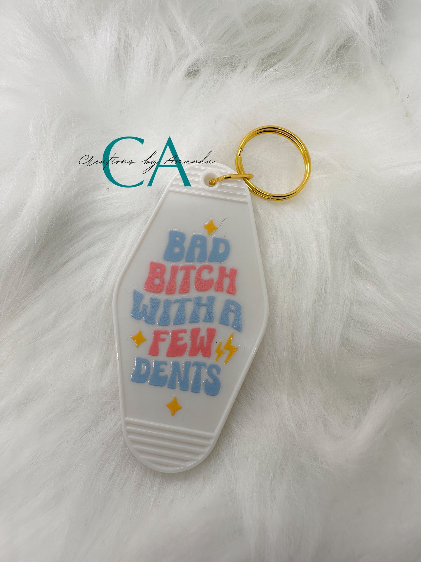 Motel Keychain - Bad Bitch With a Few Dents (White)